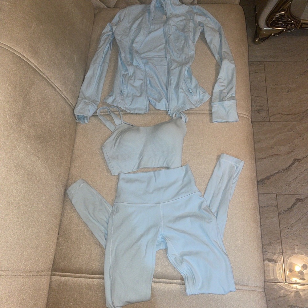 lululemon 3 piece set powder blue size 4; comes with sports bra, jacket, 28 inch